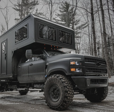 Black Chevy Silverado Expedition Camper