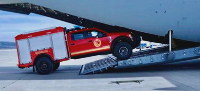 Red Fire Truck Cargo Plane Loading
