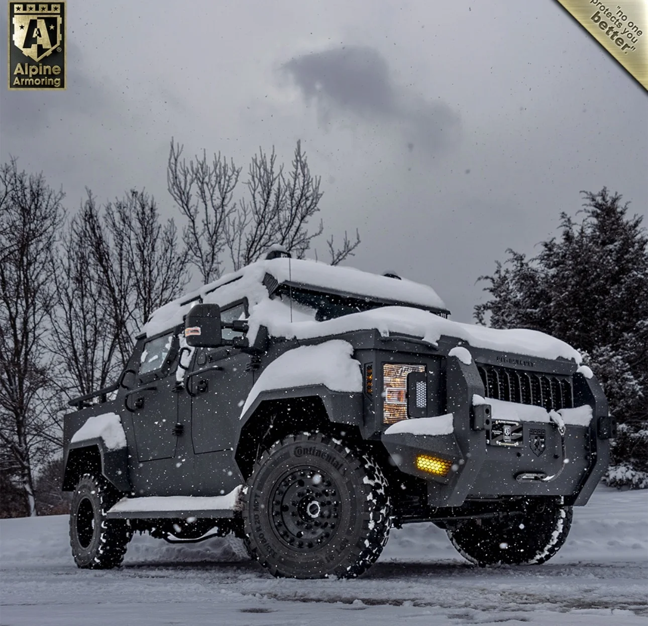 Armored tactical personnel vehicle on DBL super single wheels with Continental military tires in snow