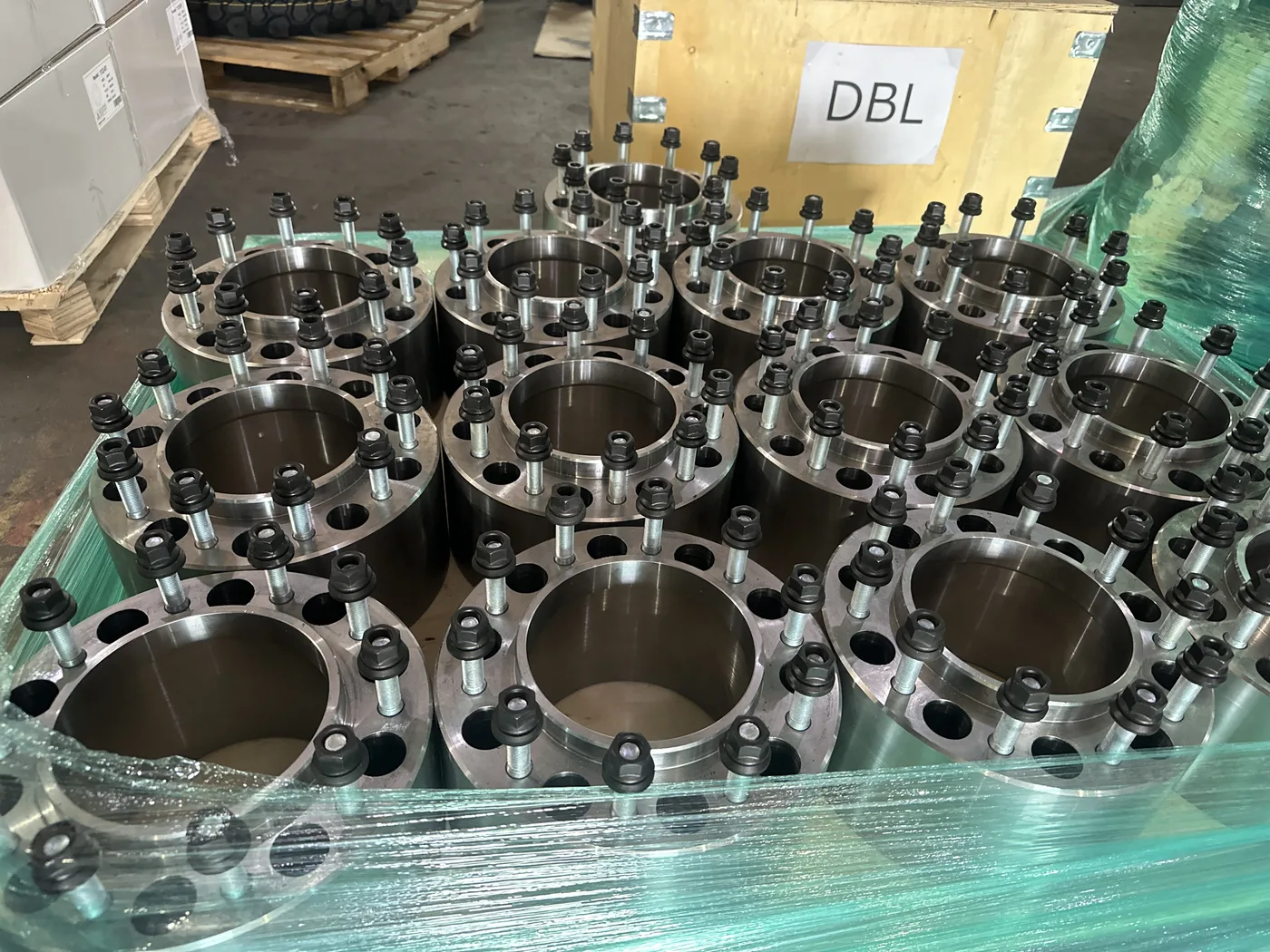 Machined rear wheel spacers on a pallet