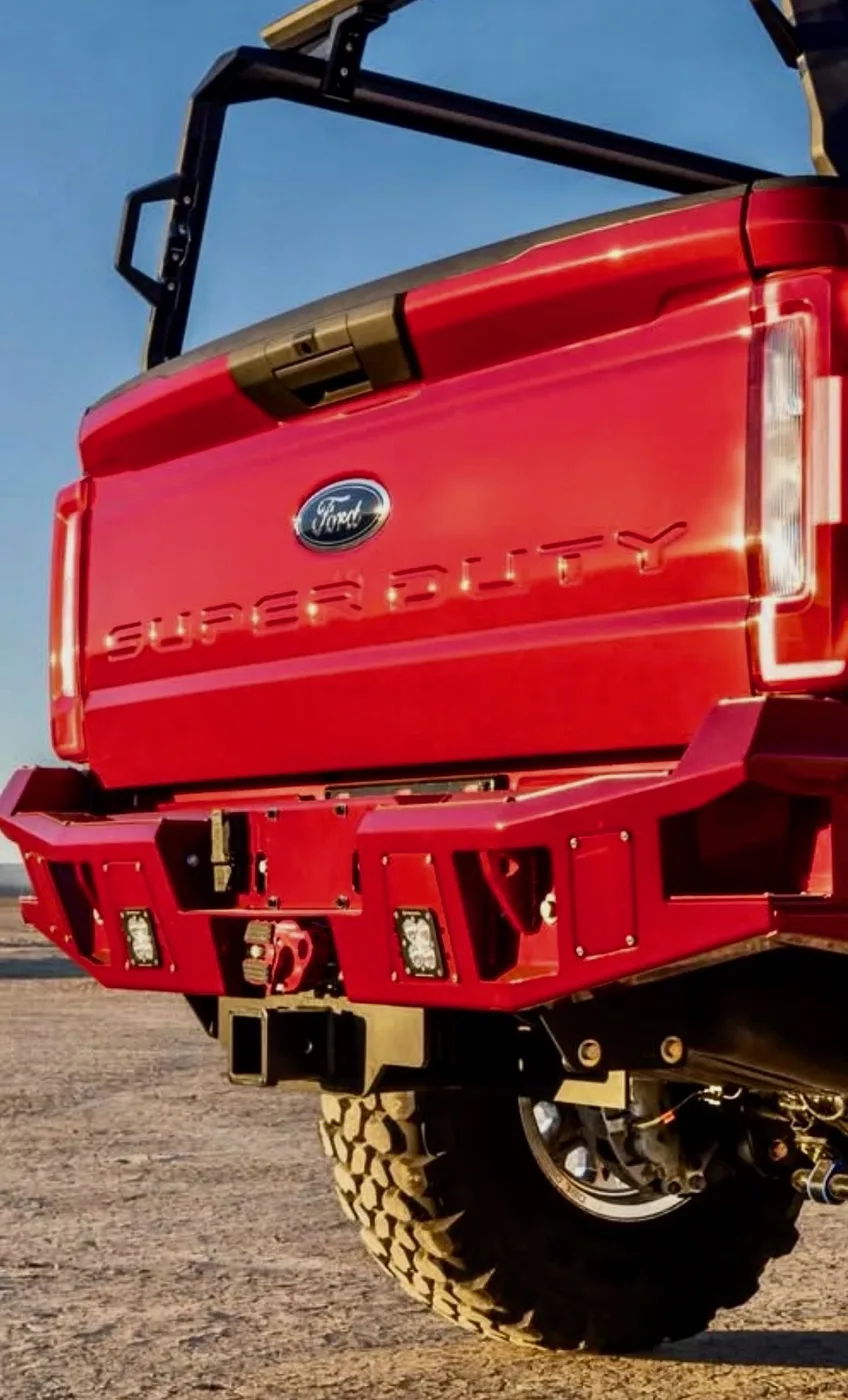 Rear winch hitch integrated into a color-matched rear bumper